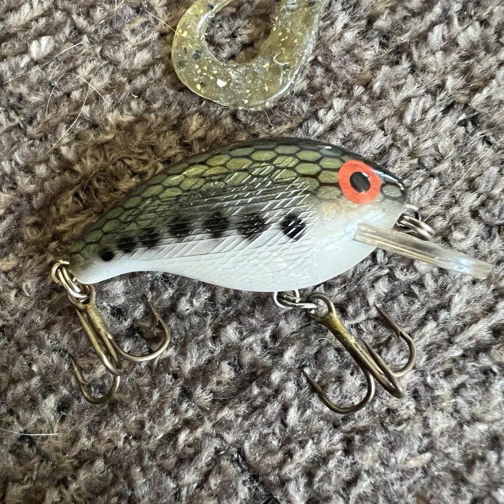 Plano Tackle Box Lot with Rebel Lure Bucktail Jigs Hooks Swivels and Hand Reel